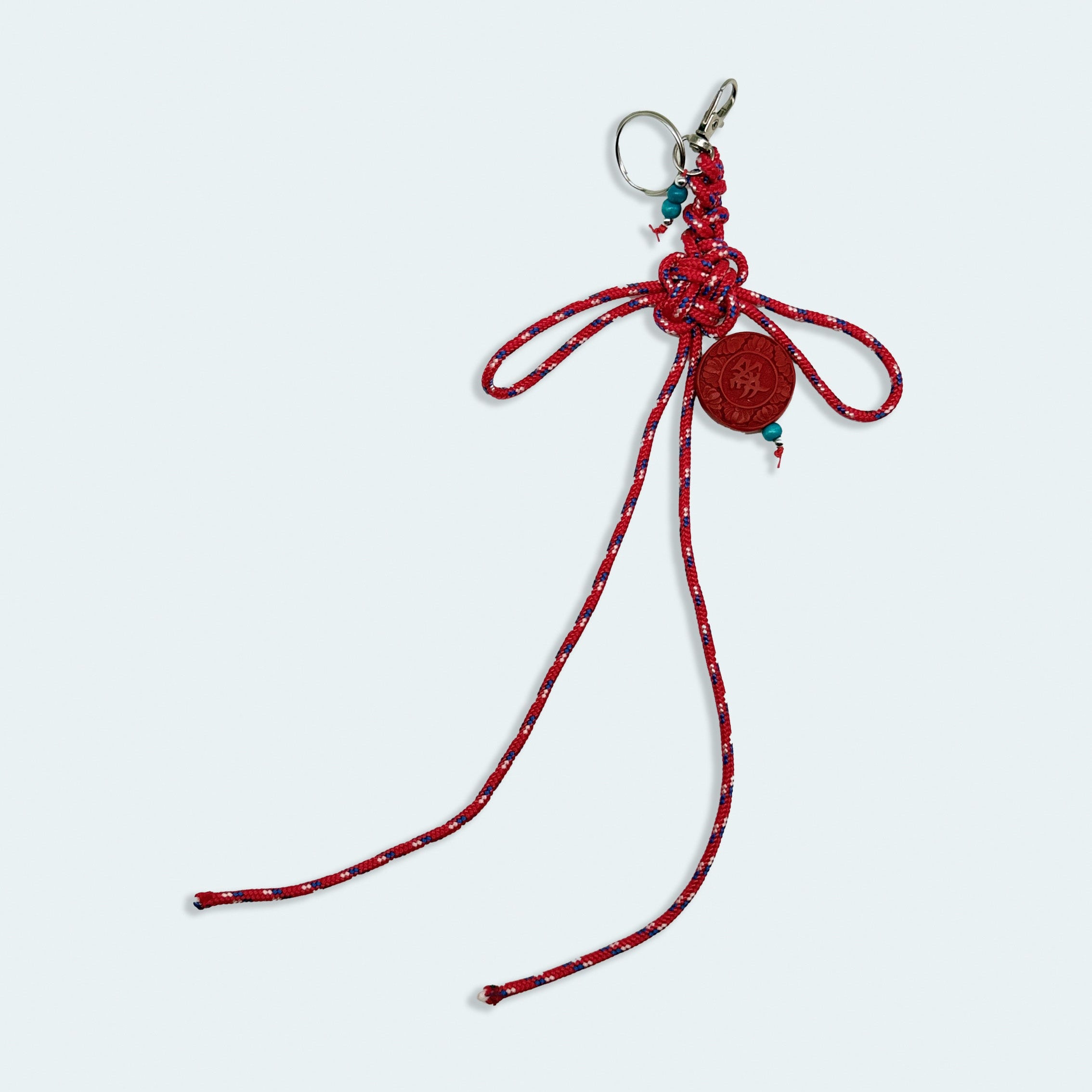 'a charmed charm' patterned red
