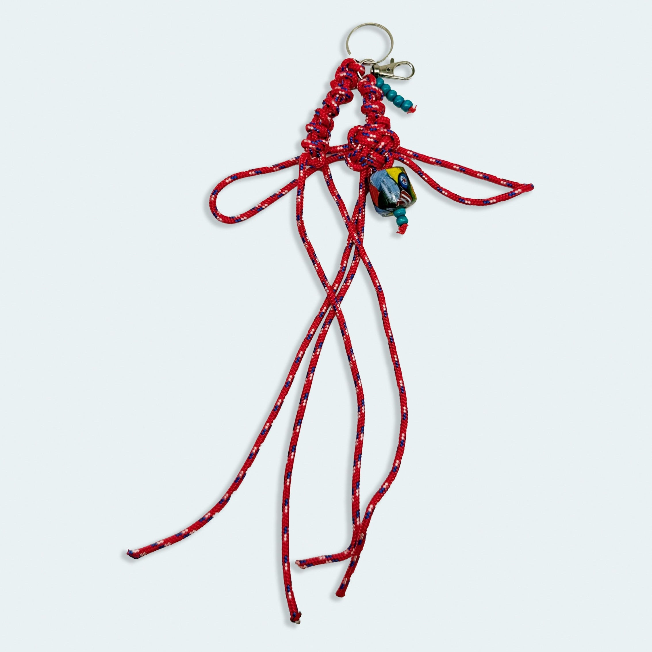 'a charmed charm' patterned red